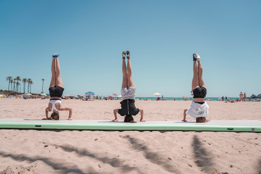 Gymnasts performing handstand at Indomove Academy